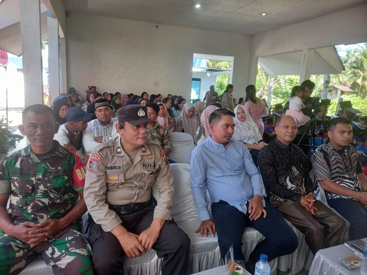 Polsek Tanah Jawa Hadiri Pelepasan Siswa PAUD Melati dan Sampaikan Pesan Kamtibmas