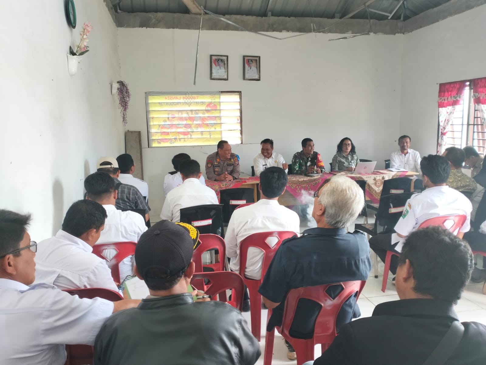 Kapolsek Dolok Silau Hadiri Rapat Harungguan dan Sosialisasi BPJS, Sampaikan Pesan Kamtibmas dan Bah