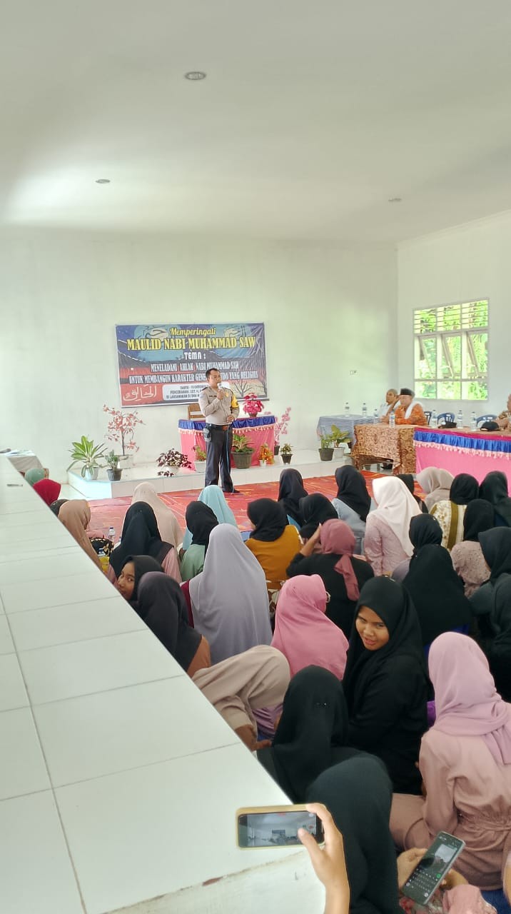 Polsek Raya Kahean Hadiri Peringatan Maulid Nabi di SMA N 1 Raya Kahean