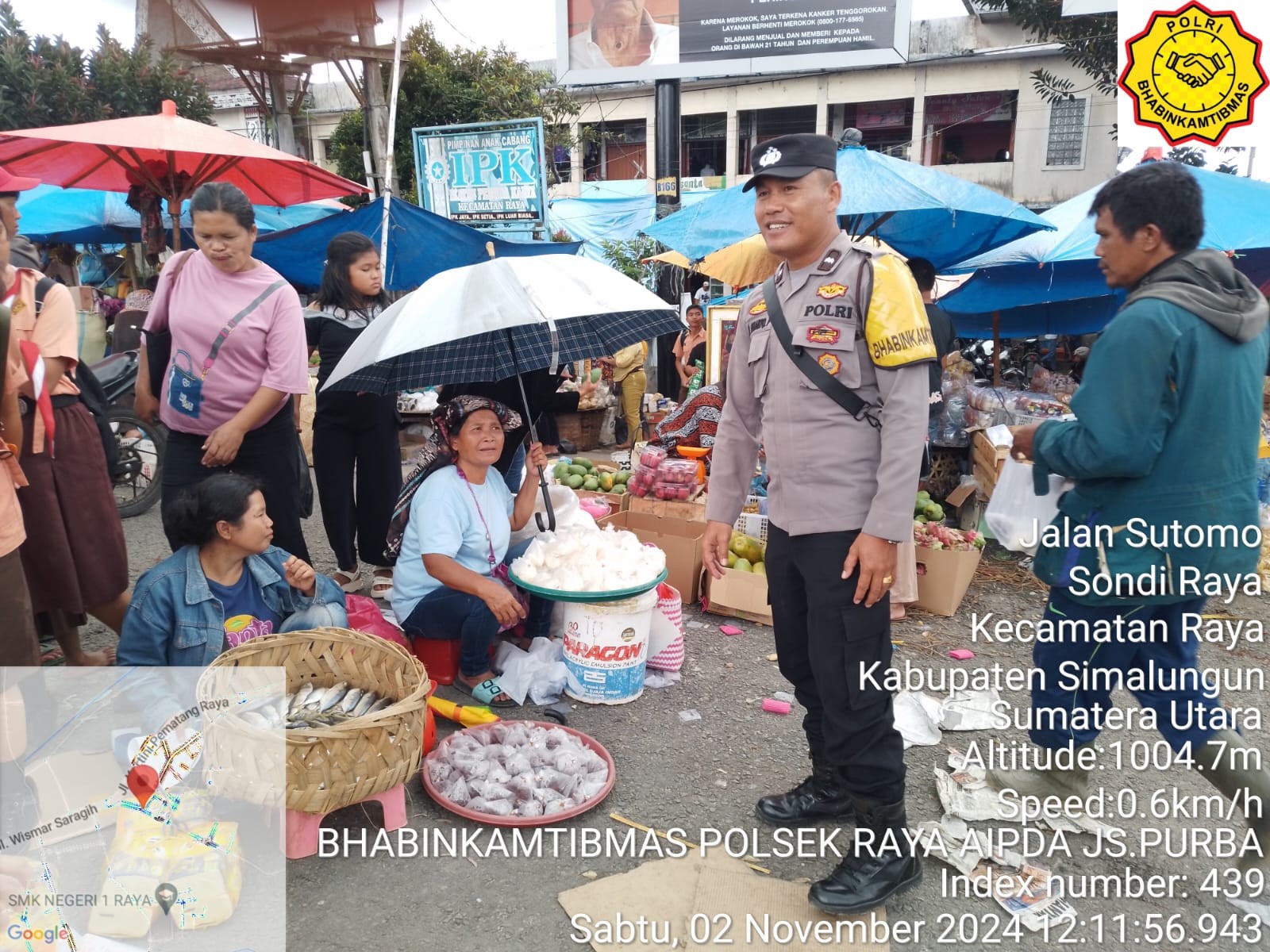 Bhabinkamtibmas Polsek Raya Berikan Rasa Aman di Pasar Modern Pematang Raya